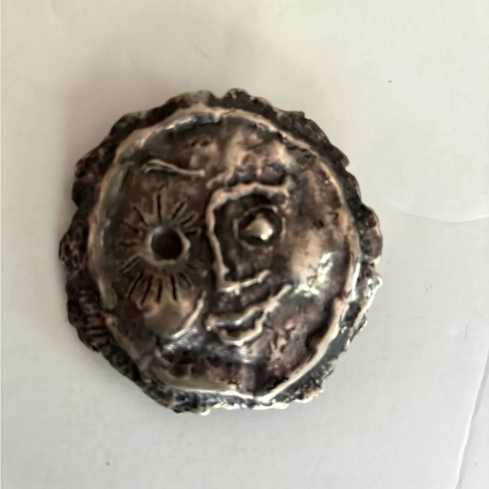 Three vintage belt buckles